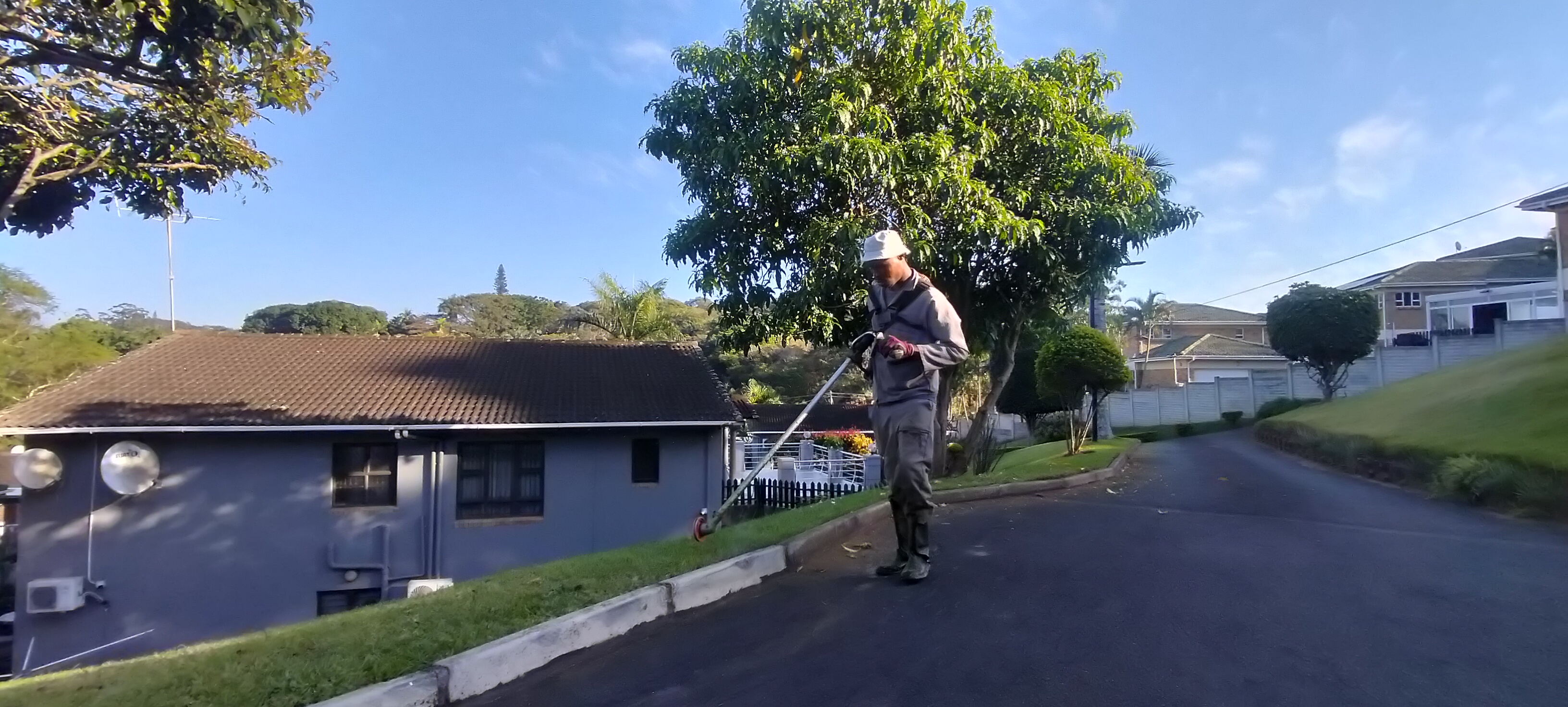 SCGM team member completing precision lawn edging